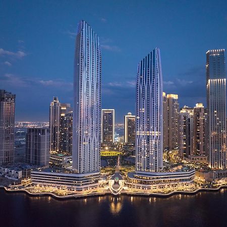 Hotel Address Creek Harbour Dubaj Exteriér fotografie The complex at night